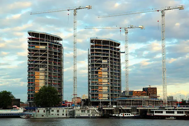 Two buildings under construction in London, England.